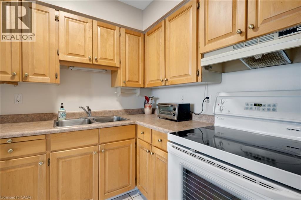 24 Midland Drive Unit# 708, Kitchener, ON - Indoor Photo Showing Kitchen With Double Sink
