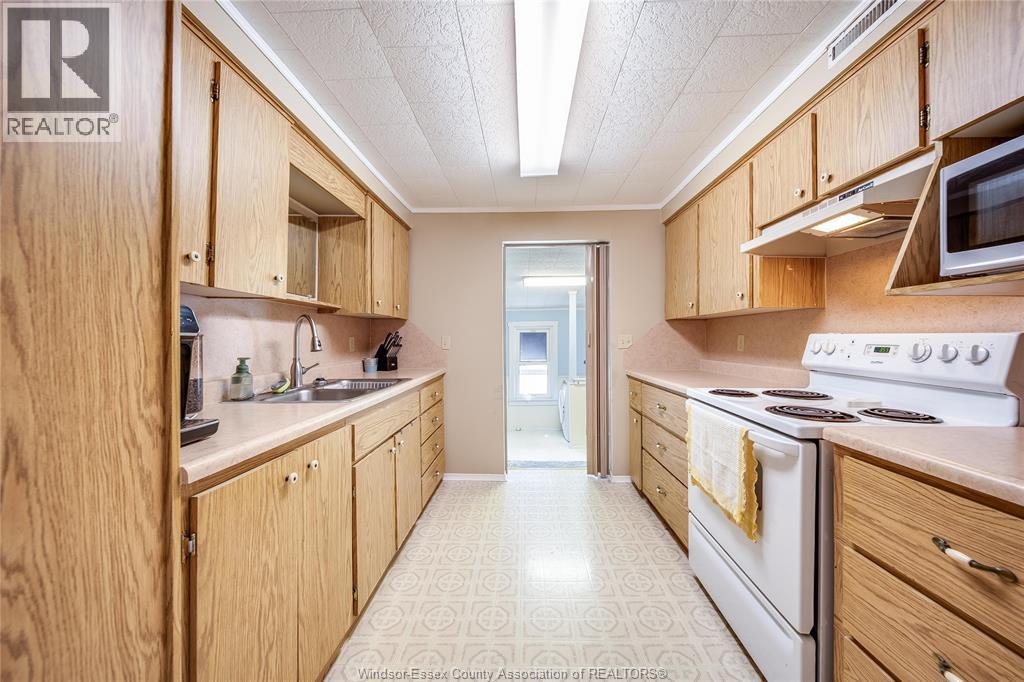 178 First Street, Belle River, ON - Indoor Photo Showing Kitchen With Double Sink