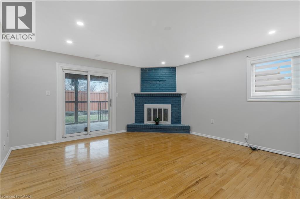 2 Envoy Boulevard, Hamilton, ON - Indoor Photo Showing Living Room With Fireplace