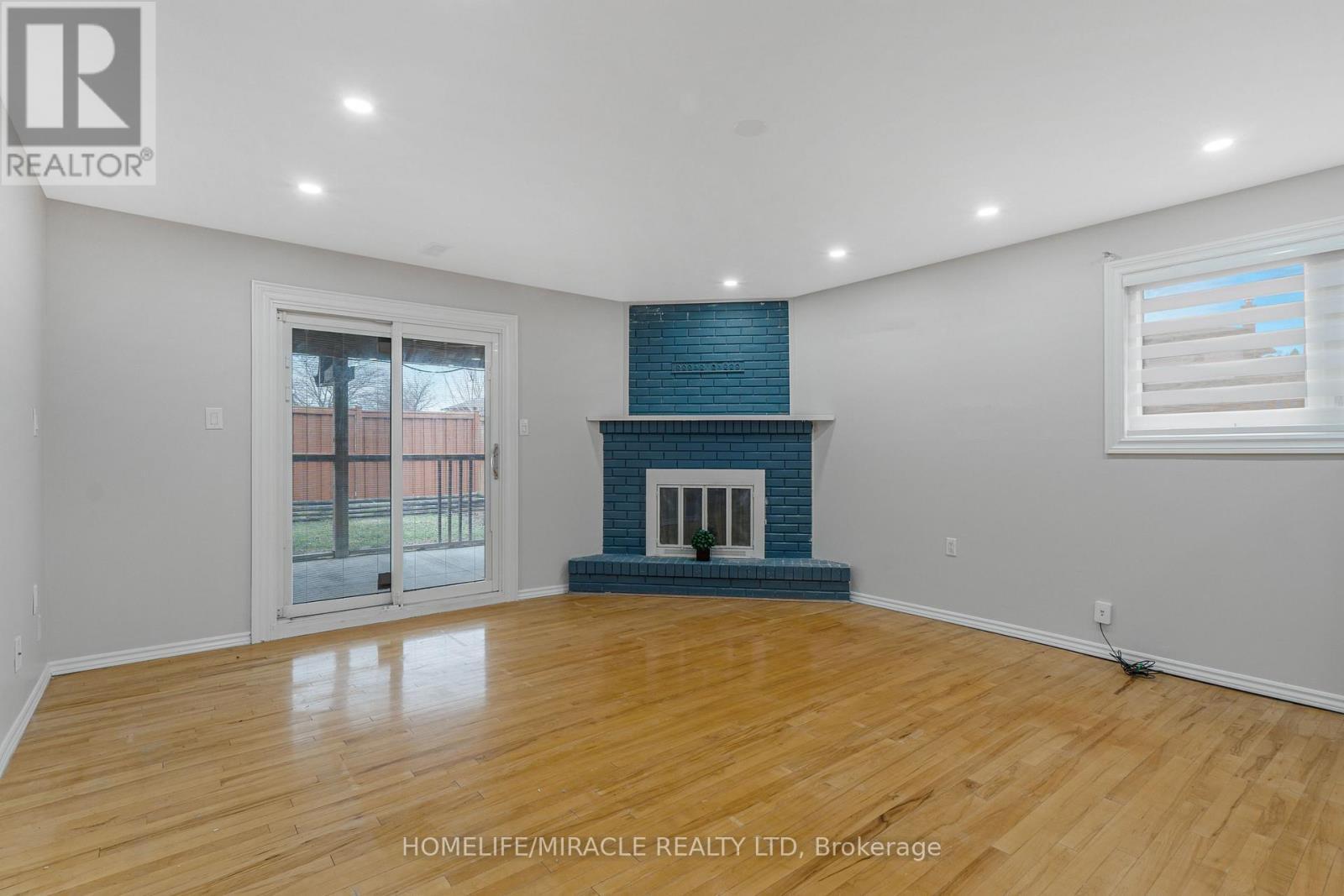 2 Envoy Boulevard, Hamilton, ON - Indoor Photo Showing Other Room With Fireplace
