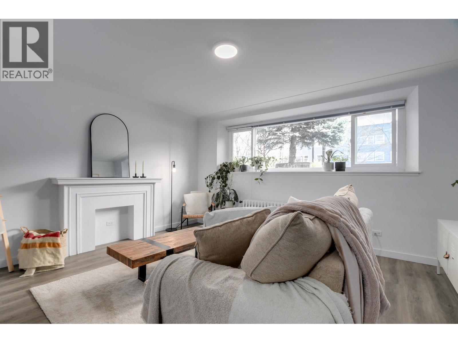 3755 Cambie Street, Vancouver, BC - Indoor Photo Showing Bedroom With Fireplace