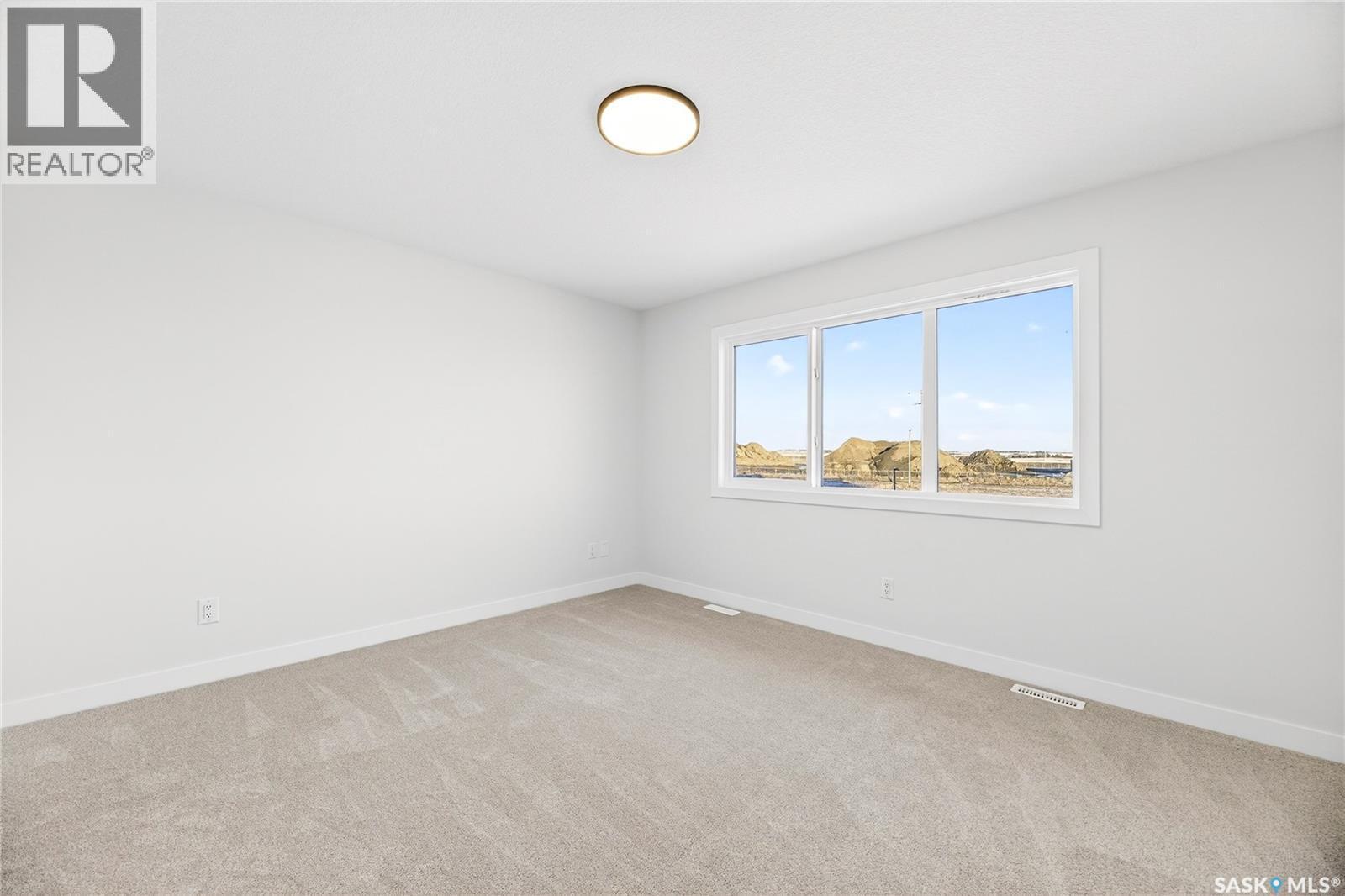 283 Nazarali Way, Saskatoon, SK - Indoor Photo Showing Other Room