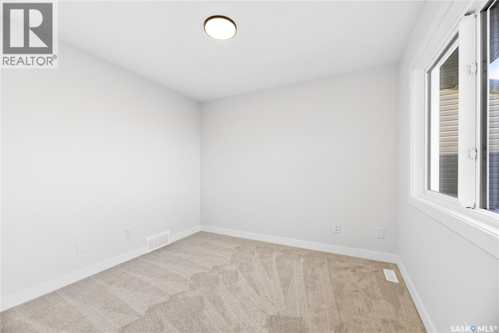 283 Nazarali Way, Saskatoon, SK - Indoor Photo Showing Other Room