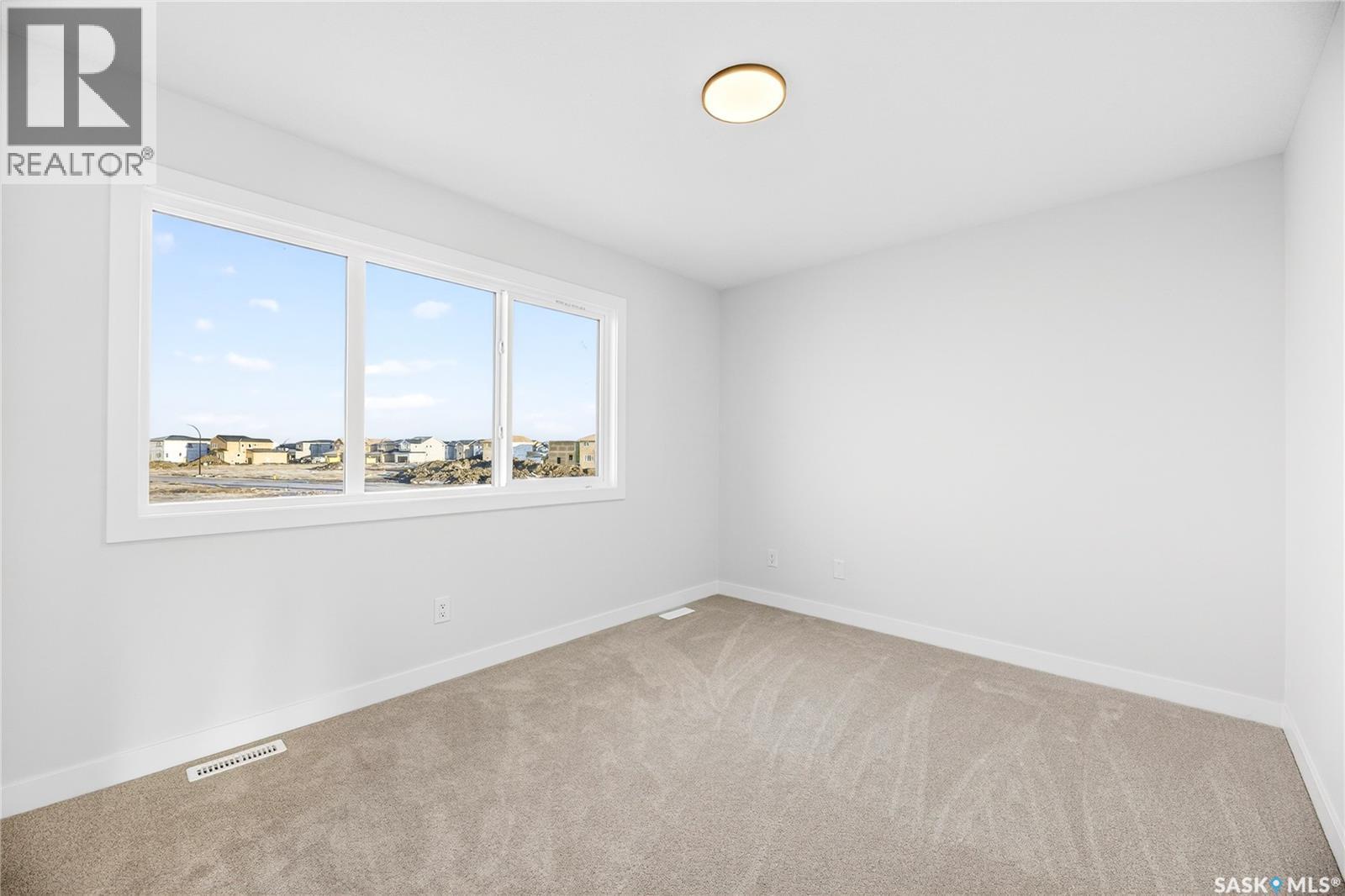 283 Nazarali Way, Saskatoon, SK - Indoor Photo Showing Other Room