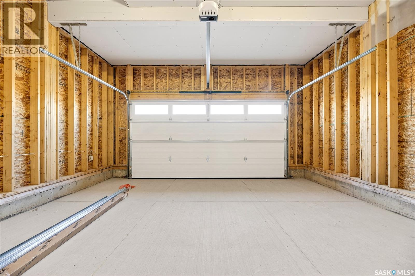 283 Nazarali Way, Saskatoon, SK - Indoor Photo Showing Garage