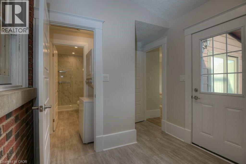 Unit B entry, laundry to bathroom and back bedroom - 54 Park Street, Kitchener, ON - Indoor Photo Showing Other Room