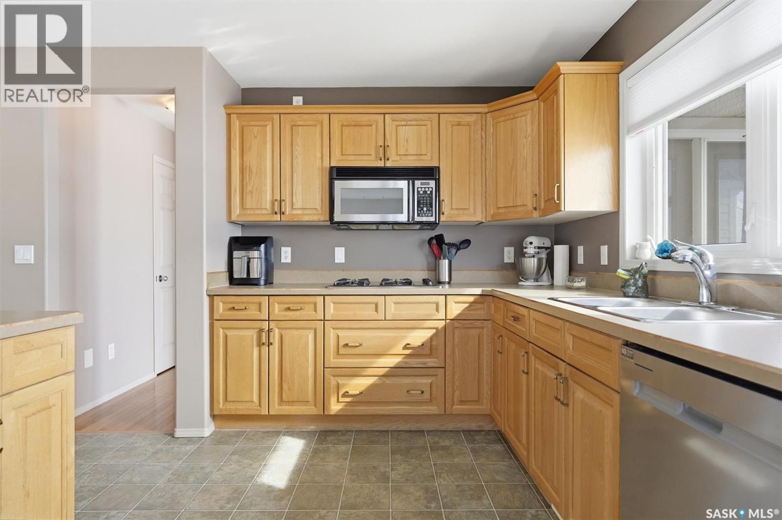 9 Pelican Pass, Thode, SK - Indoor Photo Showing Kitchen With Double Sink