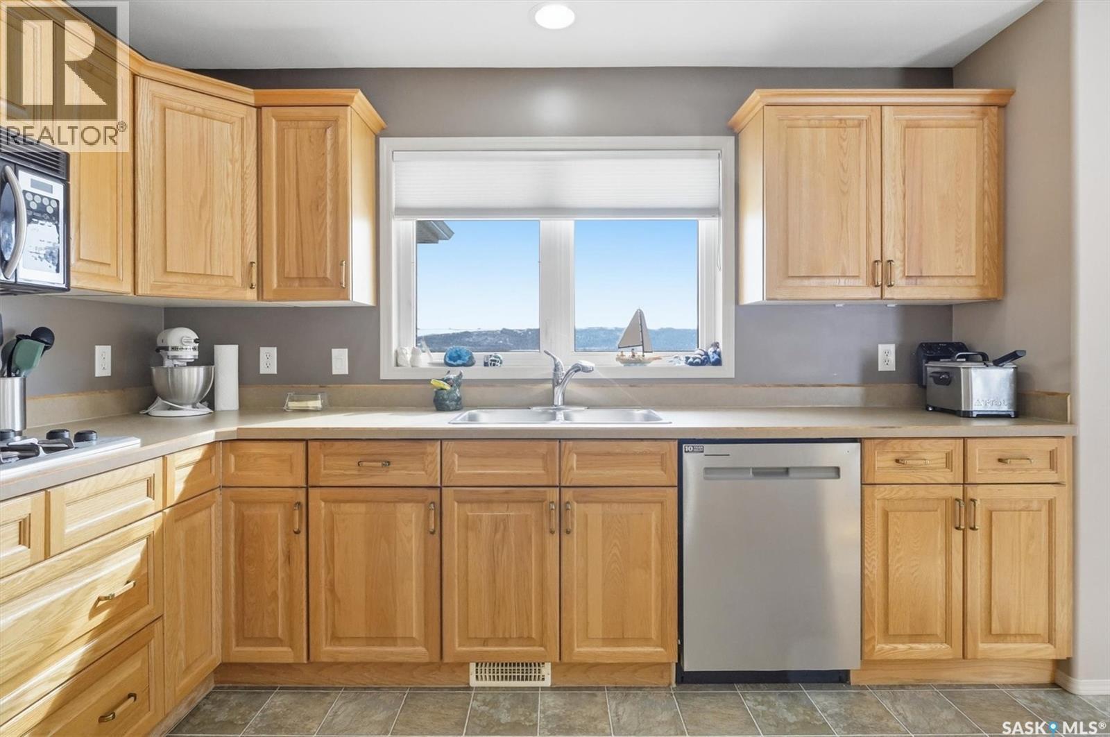 9 Pelican Pass, Thode, SK - Indoor Photo Showing Kitchen With Double Sink