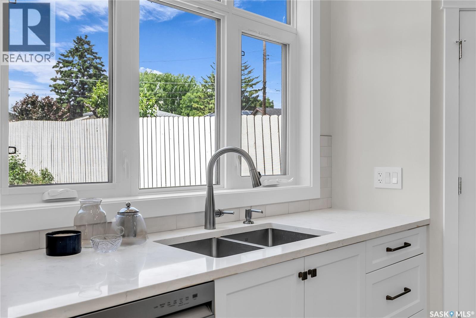 1601B 9Th Avenue N, Saskatoon, SK - Indoor Photo Showing Kitchen With Double Sink
