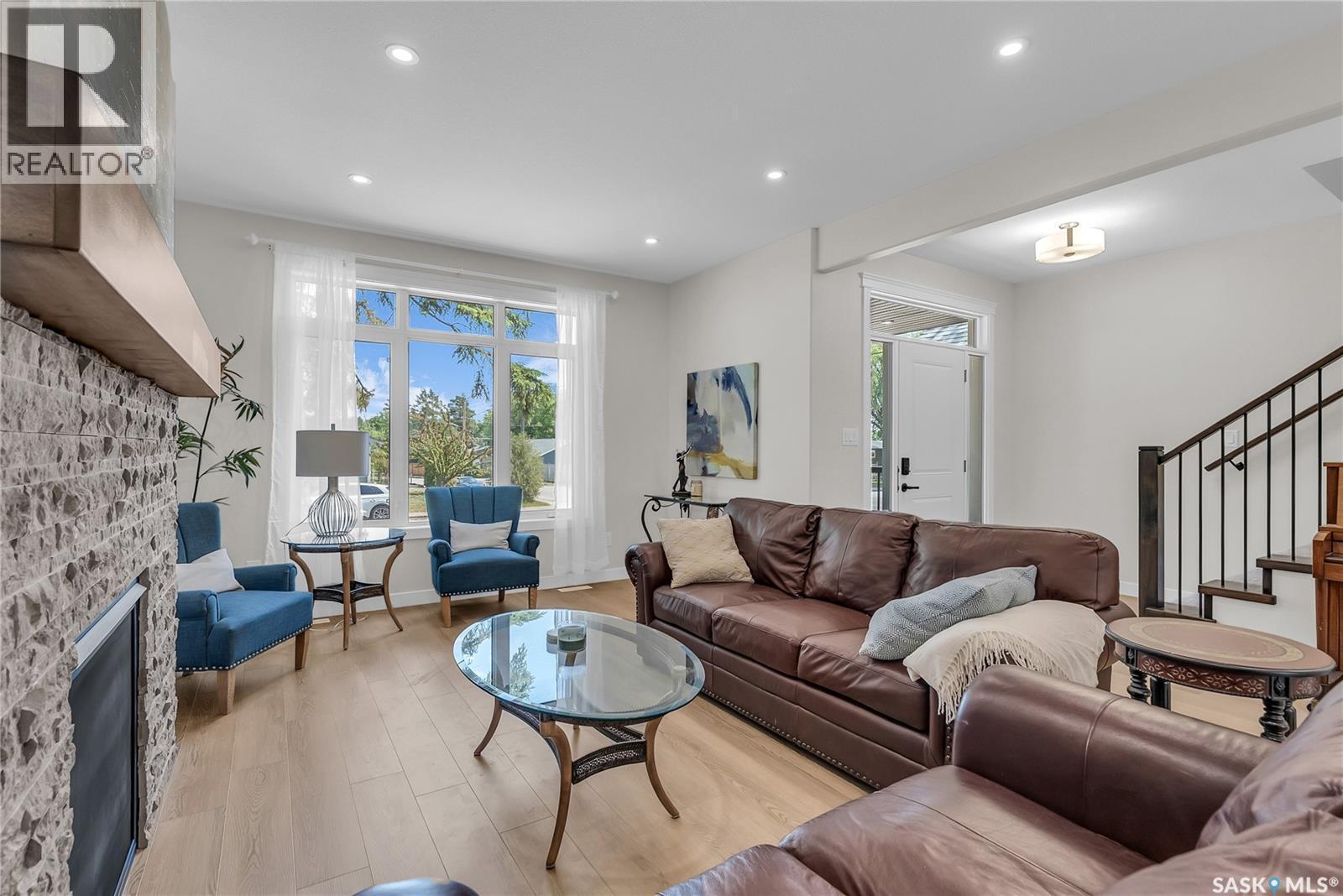 1601B 9Th Avenue N, Saskatoon, SK - Indoor Photo Showing Living Room With Fireplace