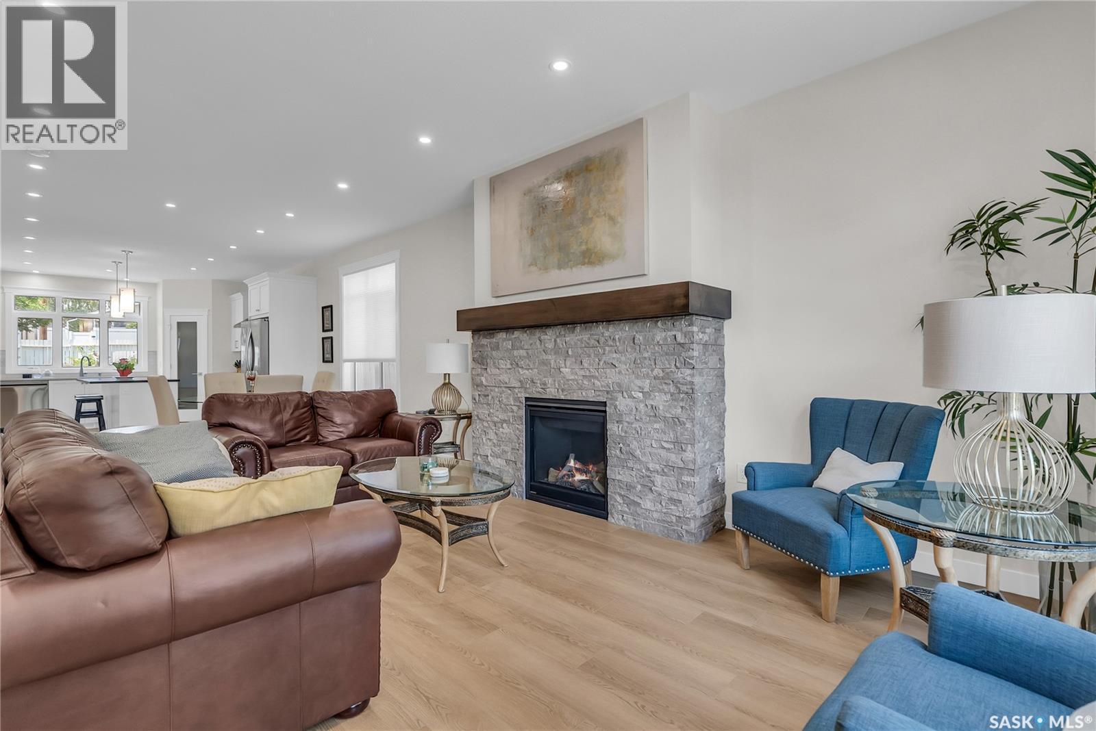 1601B 9Th Avenue N, Saskatoon, SK - Indoor Photo Showing Living Room With Fireplace