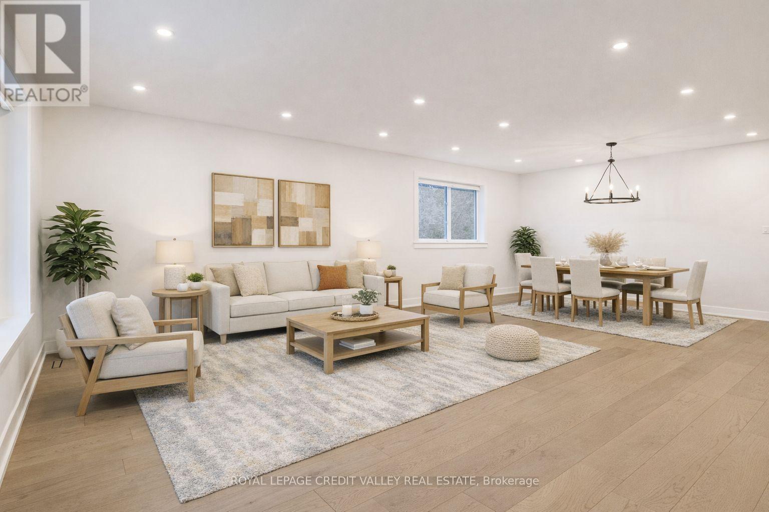 Virtually staged family room - 500 Selsey Drive, Mississauga, ON - Indoor Photo Showing Living Room