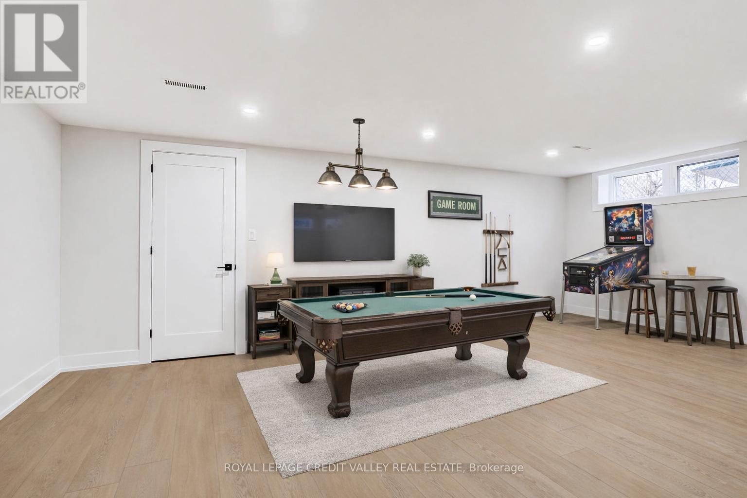 Virtually staged basement games room - 500 Selsey Drive, Mississauga, ON - Indoor Photo Showing Other Room