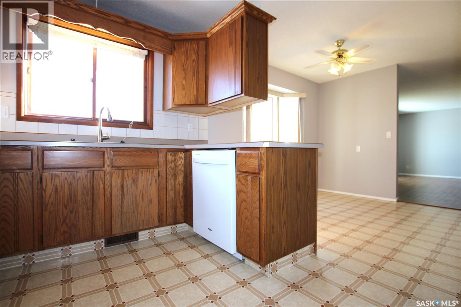 103 Langrill Drive, Yorkton, SK - Indoor Photo Showing Kitchen With Double Sink