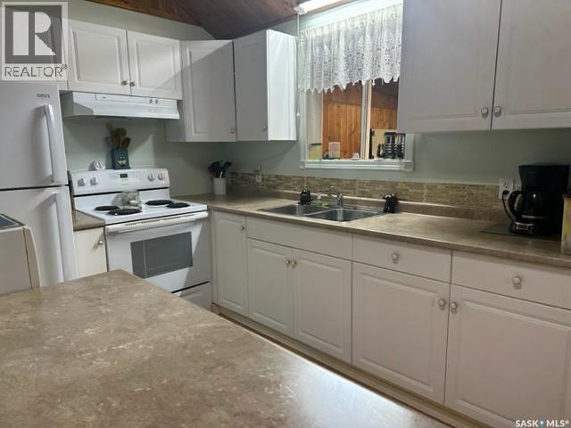711 Waskos Drive, Northern Admin District, SK - Indoor Photo Showing Kitchen With Double Sink