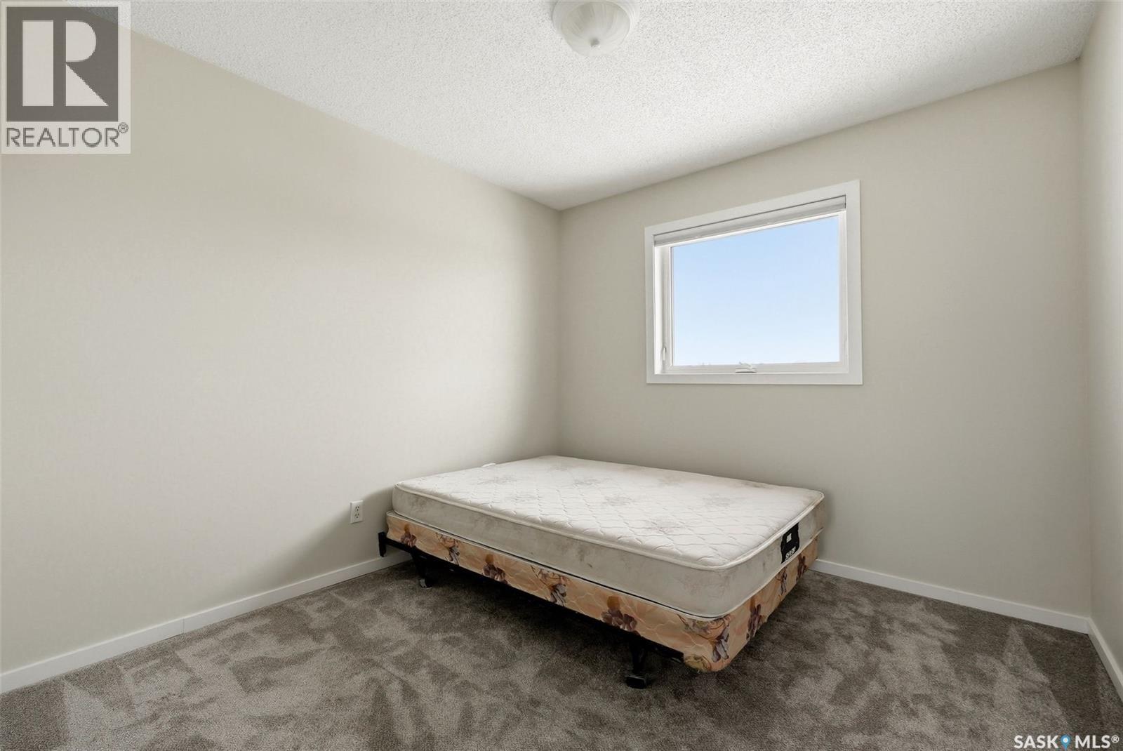 1368 Maple Leaf Crescent N, Regina, SK - Indoor Photo Showing Bedroom