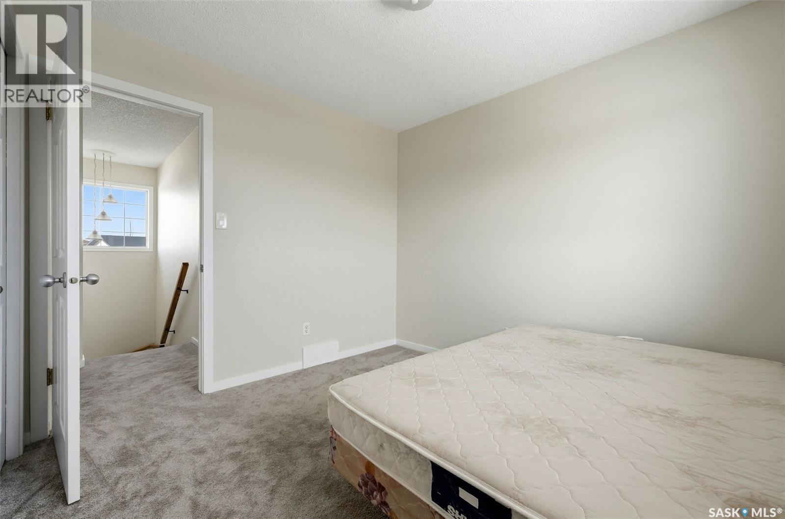 1368 Maple Leaf Crescent N, Regina, SK - Indoor Photo Showing Bedroom