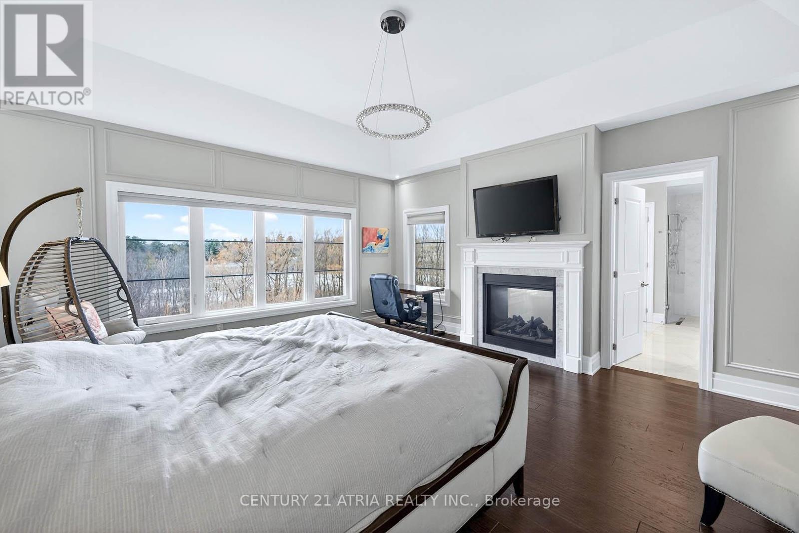 122 Burns Boulevard, King, ON - Indoor Photo Showing Bedroom With Fireplace