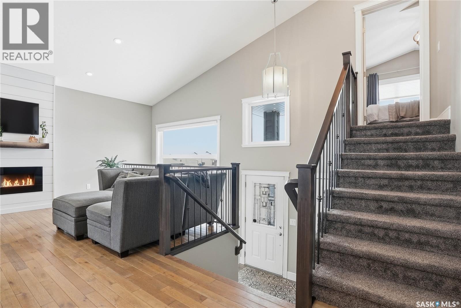 504 Snead Lane, Warman, SK - Indoor With Fireplace