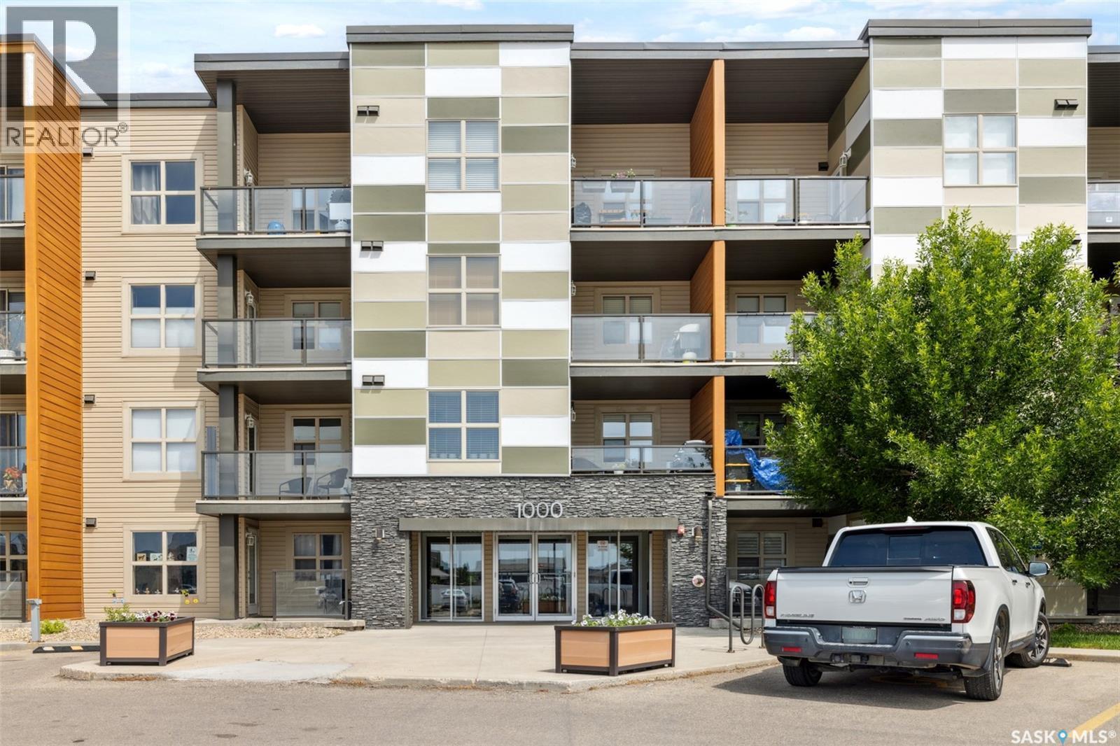 1414 5500 Mitchinson Way, Regina, SK - Outdoor With Balcony With Facade