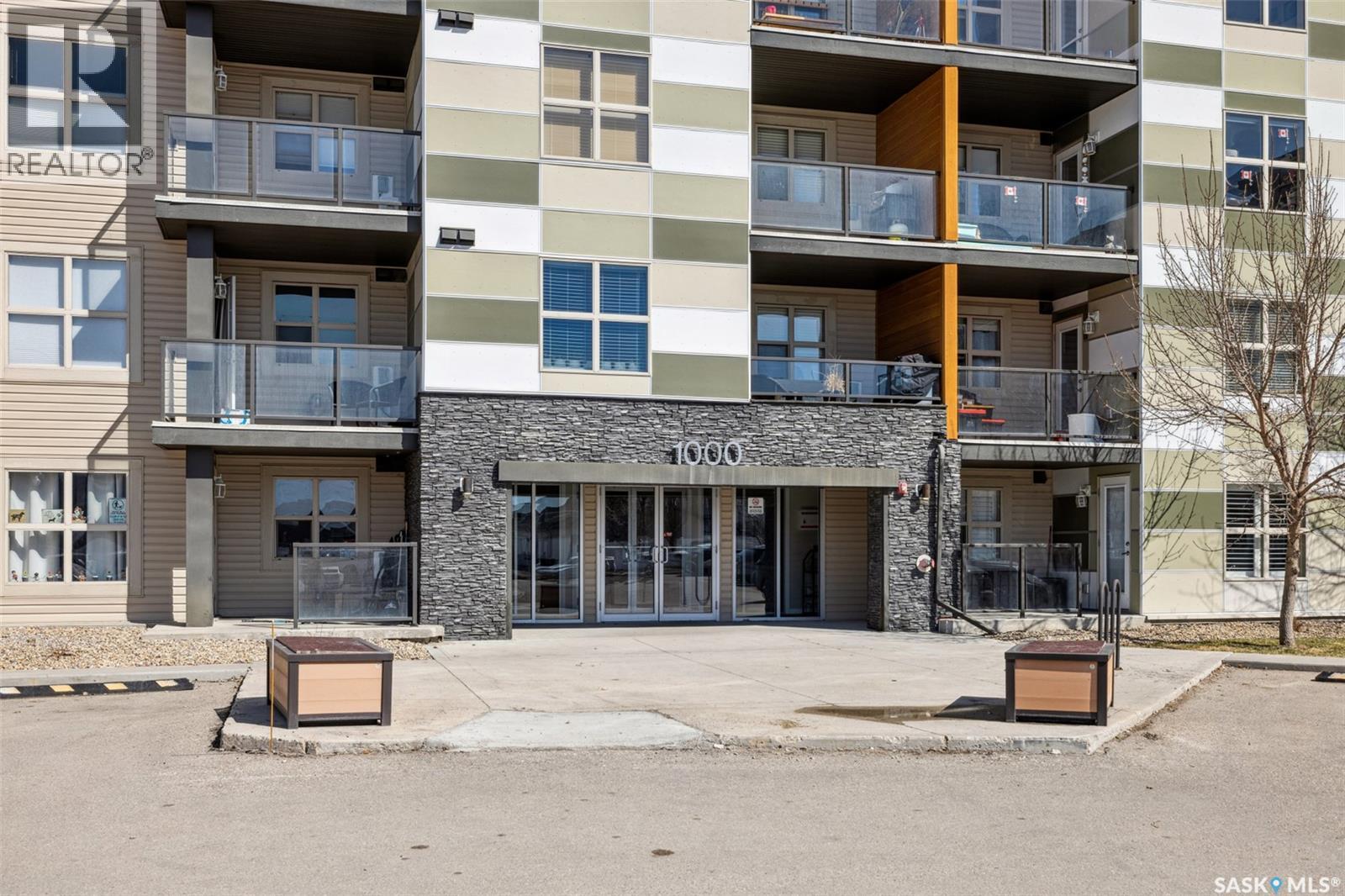 1414 5500 Mitchinson Way, Regina, SK - Outdoor With Balcony With Facade