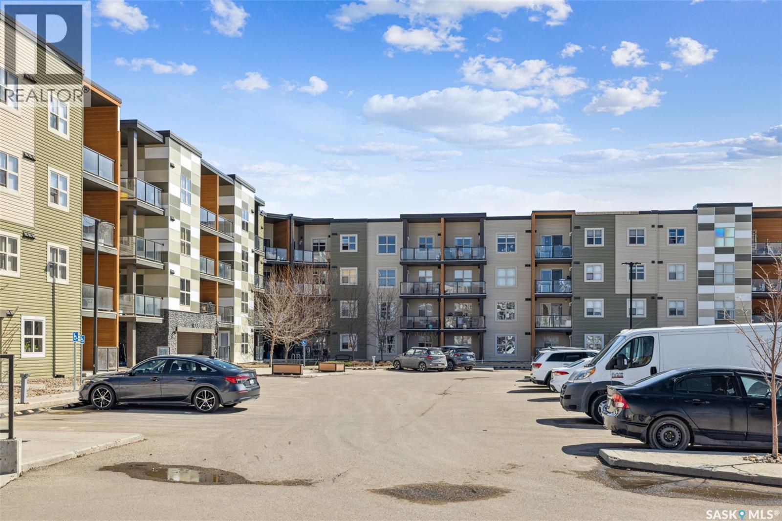 1414 5500 Mitchinson Way, Regina, SK - Outdoor With Balcony With Facade