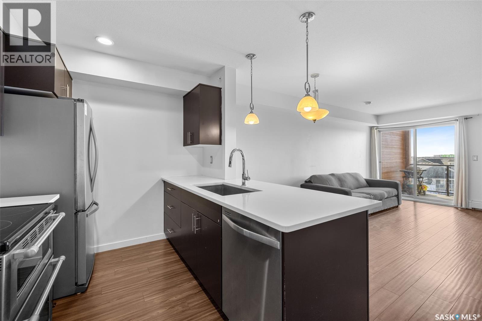 1414 5500 Mitchinson Way, Regina, SK - Indoor Photo Showing Kitchen With Upgraded Kitchen