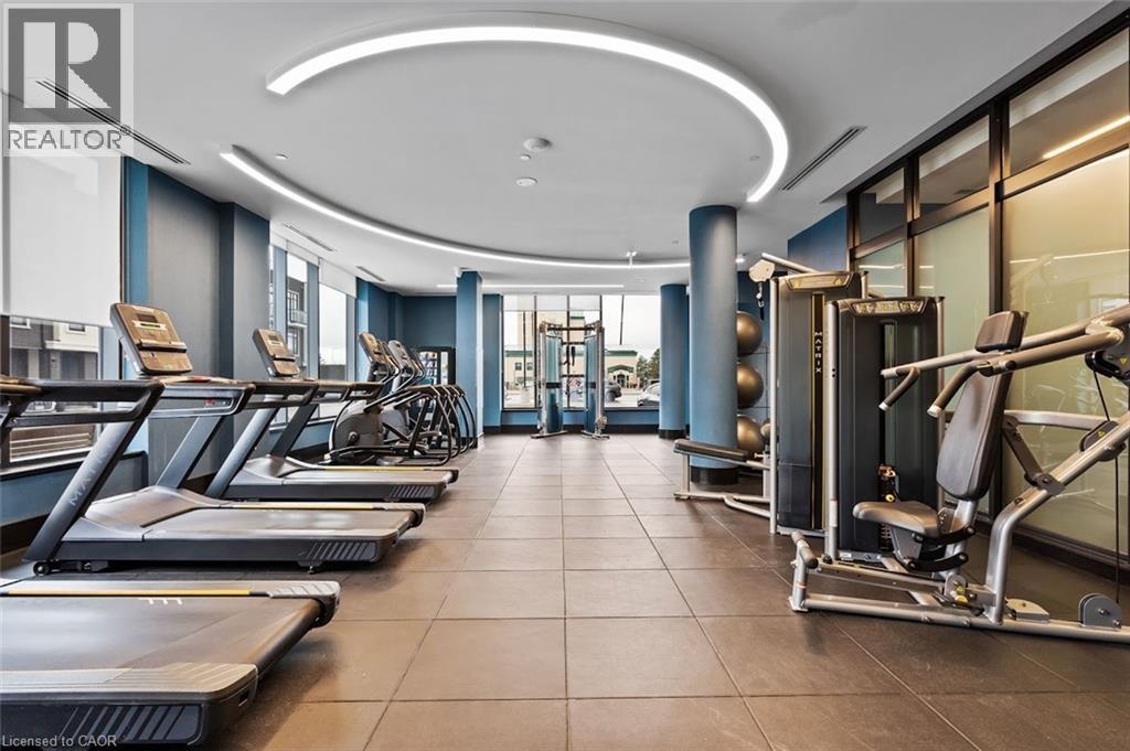 View of gym - 385 Winston Road Unit# 1311, Grimsby, ON - Indoor Photo Showing Gym Room