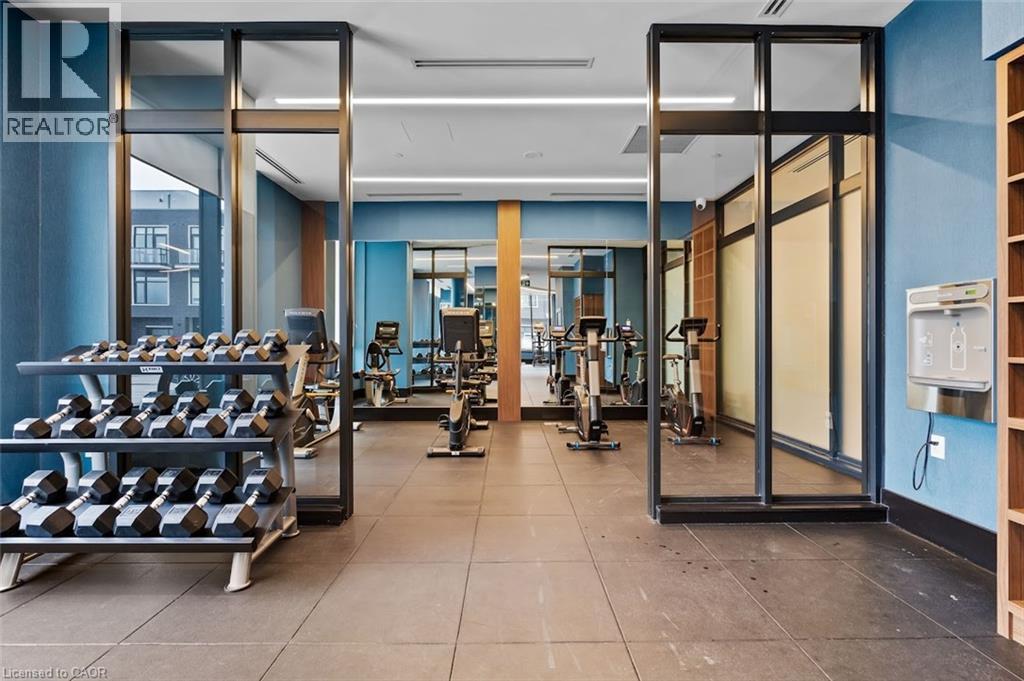 View of workout area - 385 Winston Road Unit# 1311, Grimsby, ON - Indoor Photo Showing Gym Room