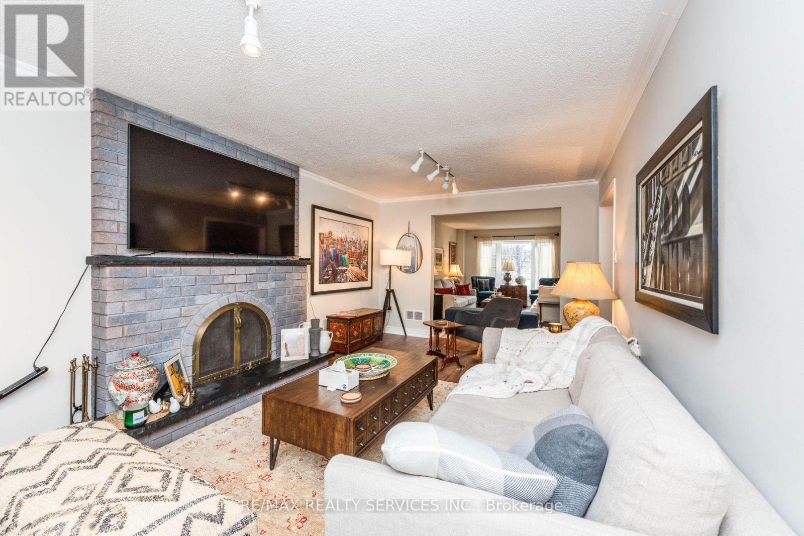 1928 Aldermead Road, Mississauga, ON - Indoor Photo Showing Living Room With Fireplace