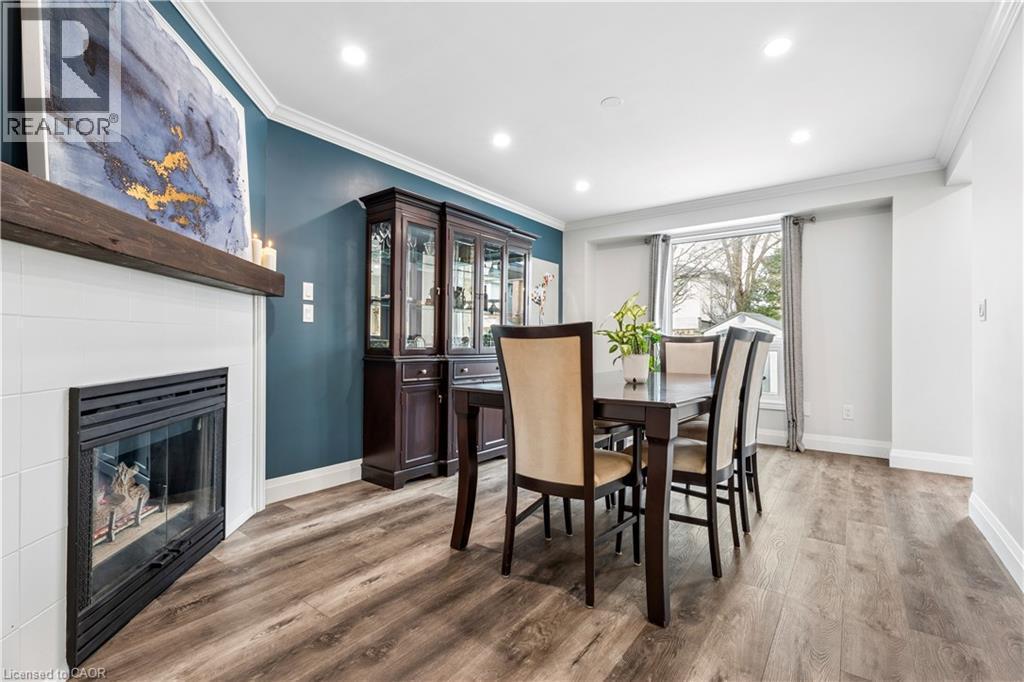 18 Marisa Court, Hamilton, ON - Indoor Photo Showing Dining Room With Fireplace