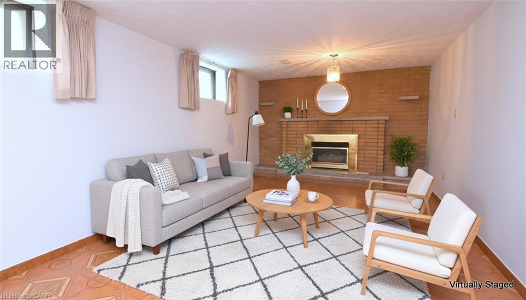 36 Glassco Avenue N, Hamilton, ON - Indoor Photo Showing Living Room With Fireplace