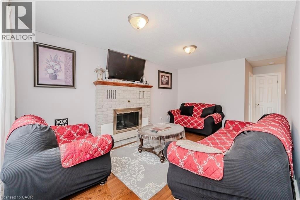 132 Trussler Road, Kitchener, ON - Indoor Photo Showing Living Room With Fireplace