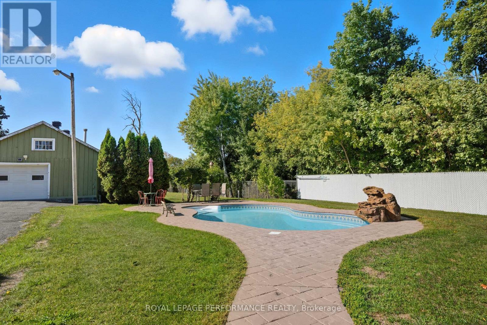 8 John Street, Champlain, ON - Outdoor With In Ground Pool