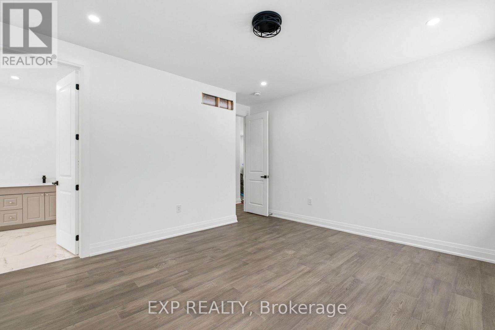 Primary bedroom - 49 Beaufort Crescent, Tiny, ON - Indoor Photo Showing Other Room
