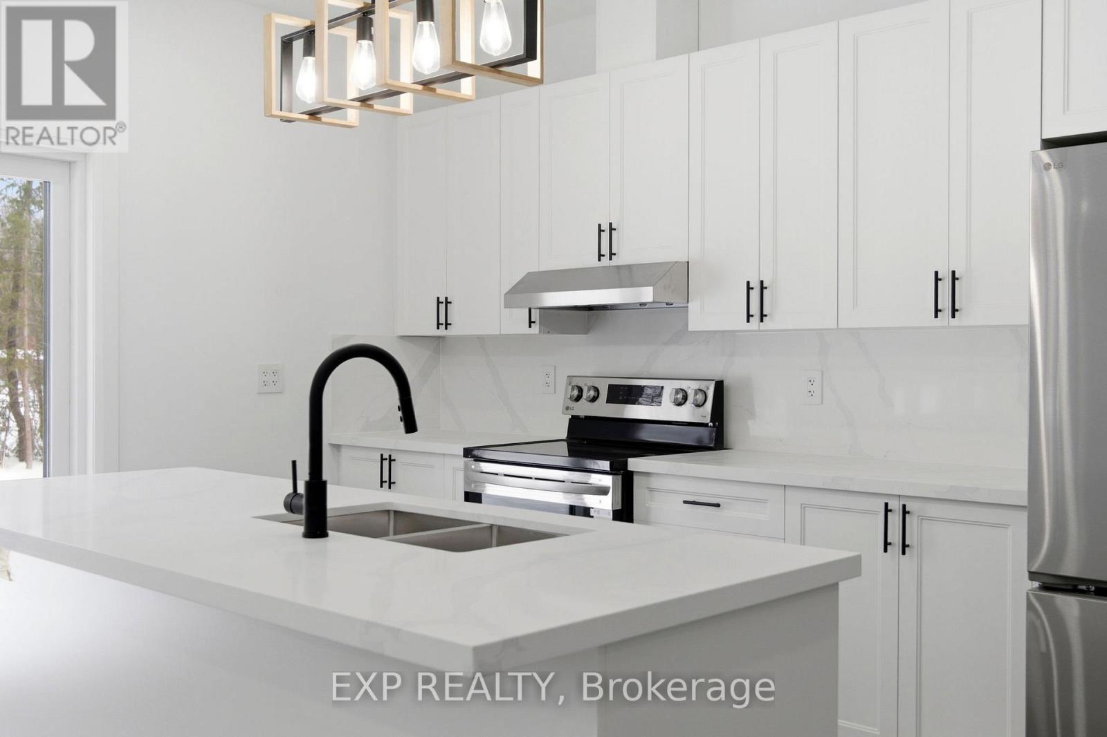 Kitchen, quartz counters, slow close doors, island - 49 Beaufort Crescent, Tiny, ON - Indoor Photo Showing Kitchen With Double Sink With Upgraded Kitchen