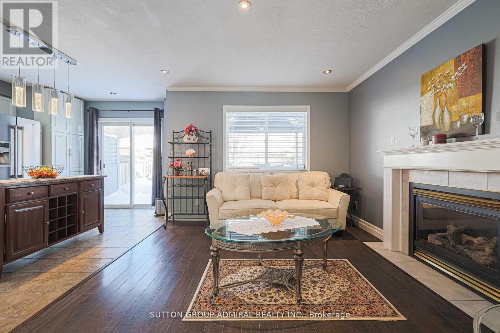 242 Mapleton Avenue, Barrie, ON - Indoor Photo Showing Living Room With Fireplace