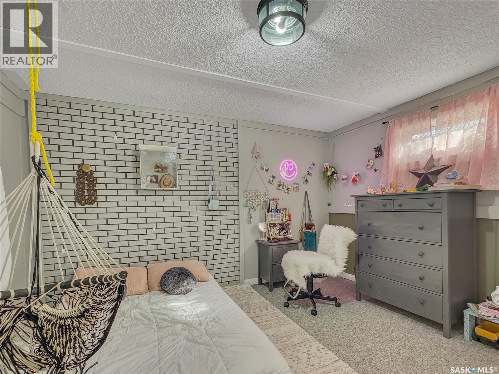 17 4Th Avenue E, Neilburg, SK - Indoor Photo Showing Bedroom