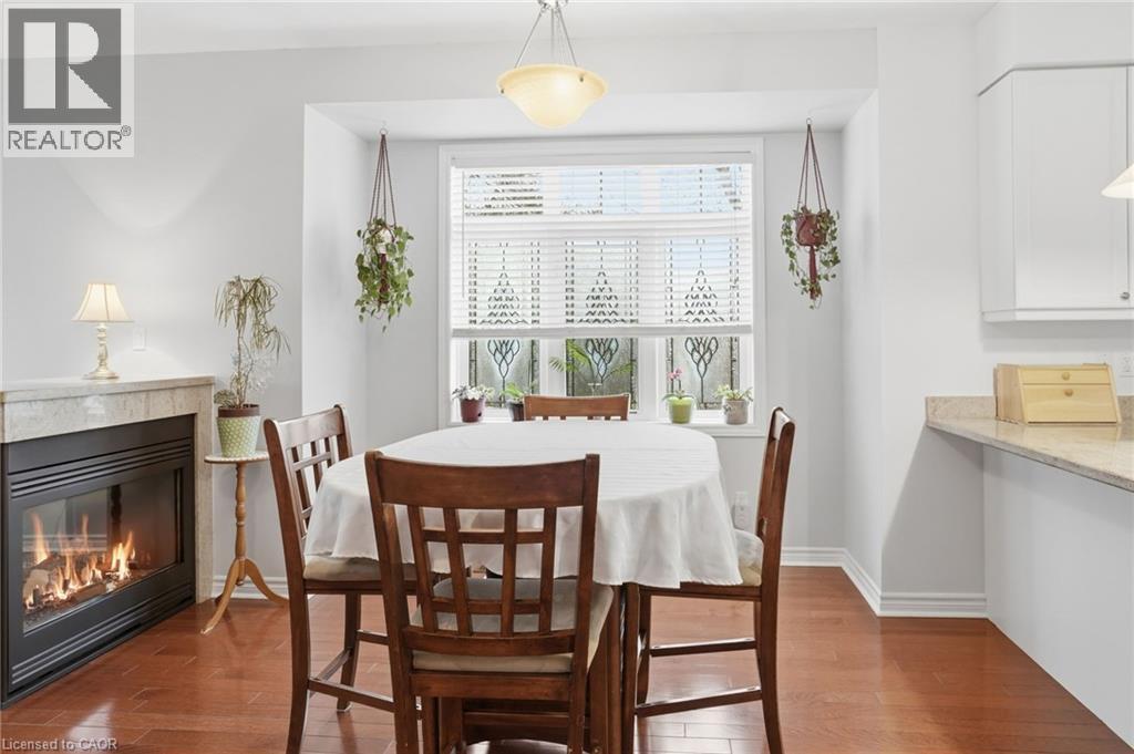 2358 Treversh Common, Burlington, ON - Indoor Photo Showing Dining Room With Fireplace