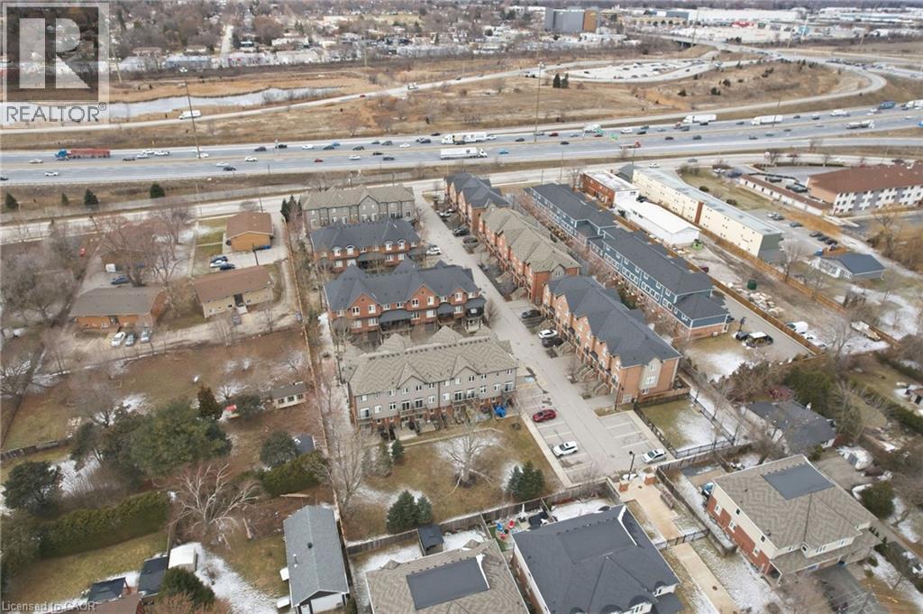 Aerial view of property's location featuring a highway and nearby suburban area - 2358 Treversh Common, Burlington, ON - Outdoor With View