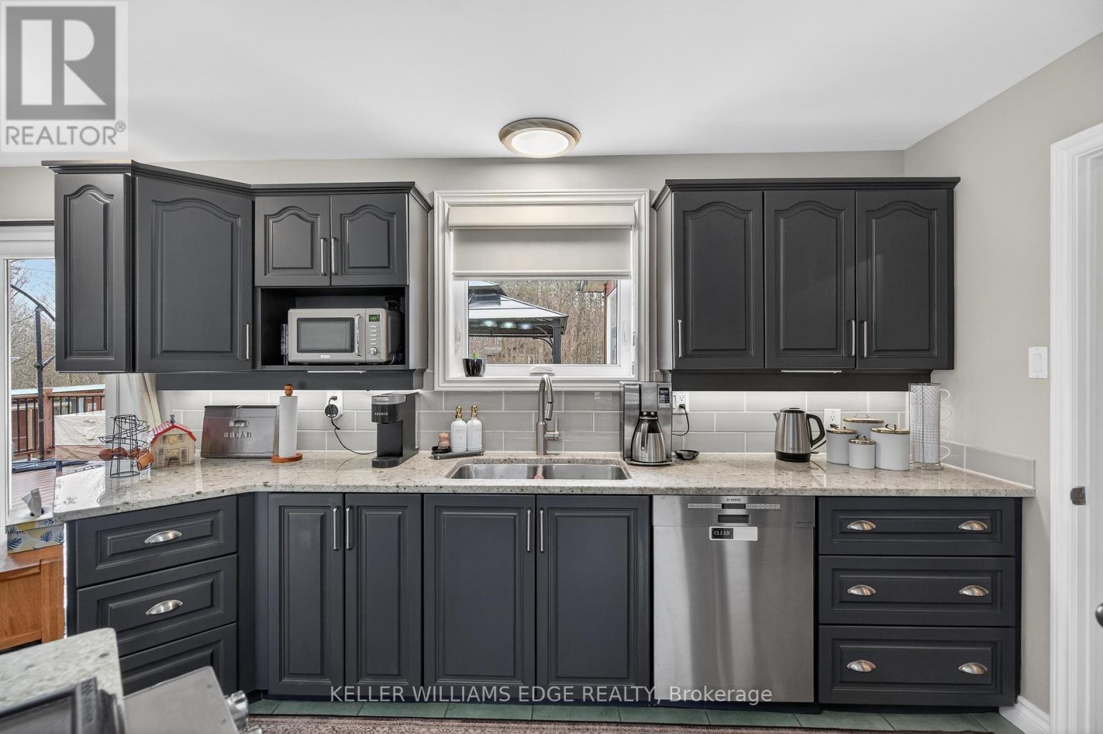 484 11Th Concession Road E, Hamilton, ON - Indoor Photo Showing Kitchen With Fireplace