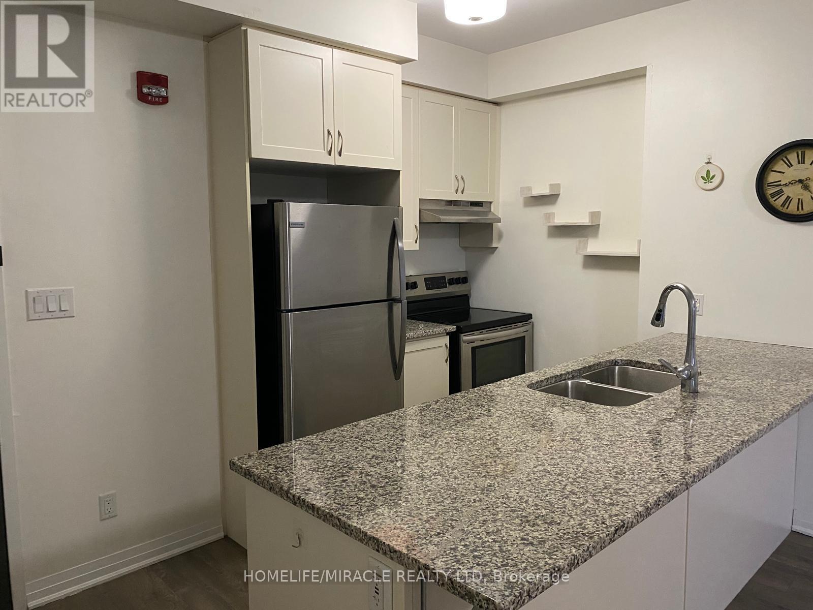 501 - 2 Adam Sellers Street, Markham, ON - Indoor Photo Showing Kitchen With Double Sink With Upgraded Kitchen