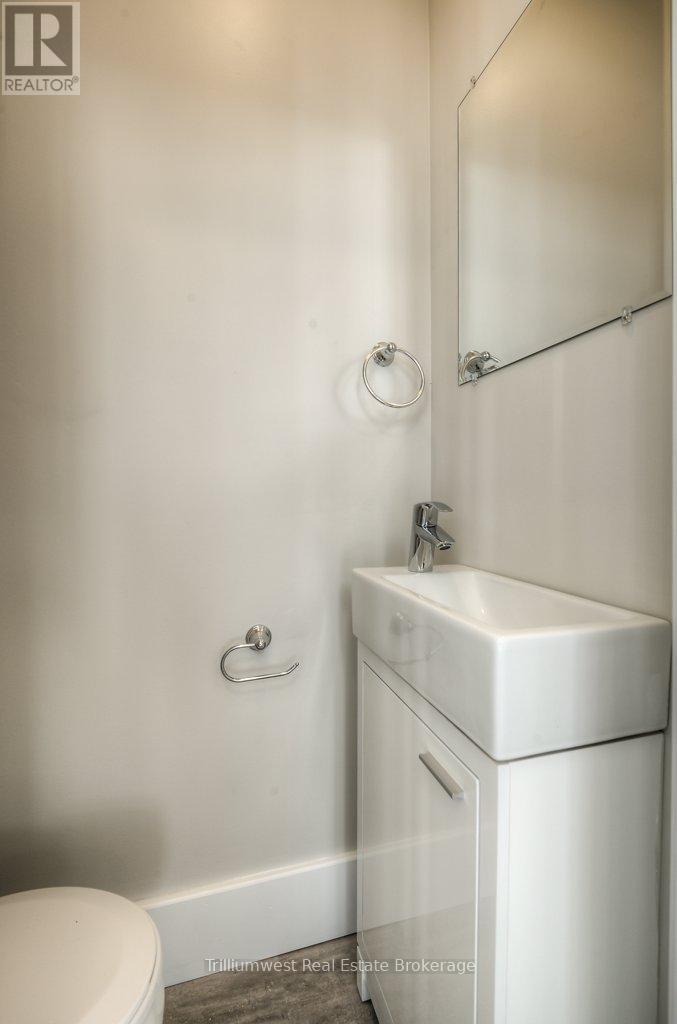 Unit A main floor 2 pc bath - 54 Park Street, Kitchener, ON - Indoor Photo Showing Bathroom