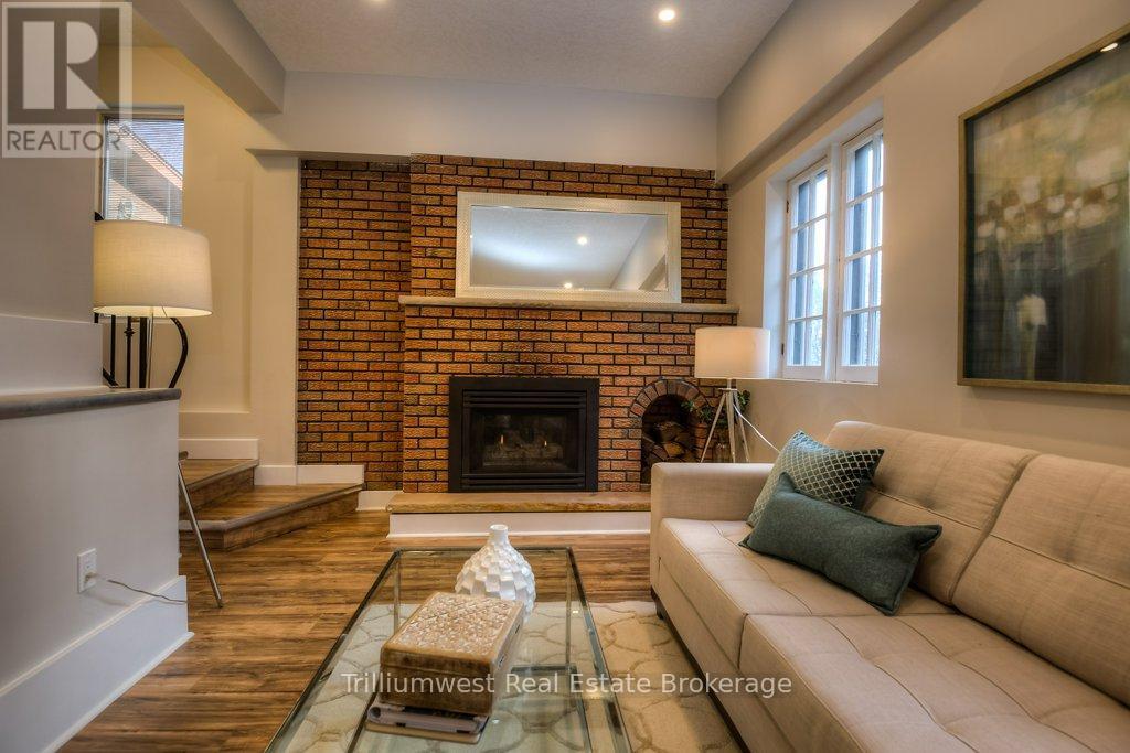 54 Park Street, Kitchener, ON - Indoor Photo Showing Living Room With Fireplace