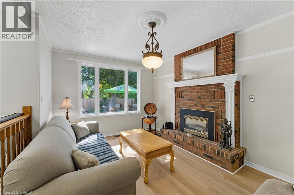 324 Burnett Avenue, Cambridge, ON - Indoor Photo Showing Living Room With Fireplace