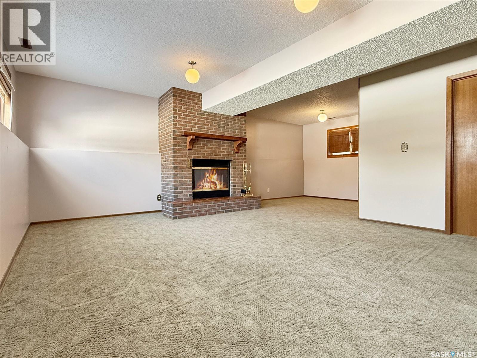 470 Cowan Drive, Swift Current, SK - Indoor With Fireplace