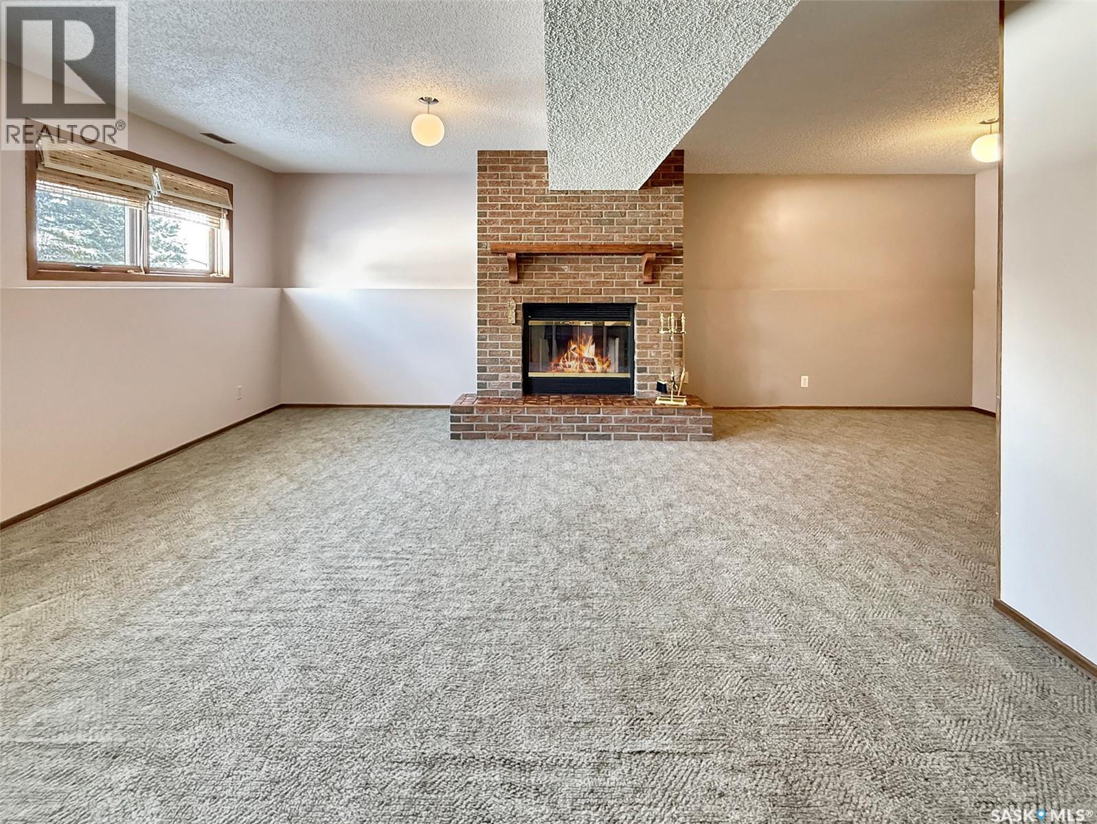 470 Cowan Drive, Swift Current, SK - Indoor With Fireplace