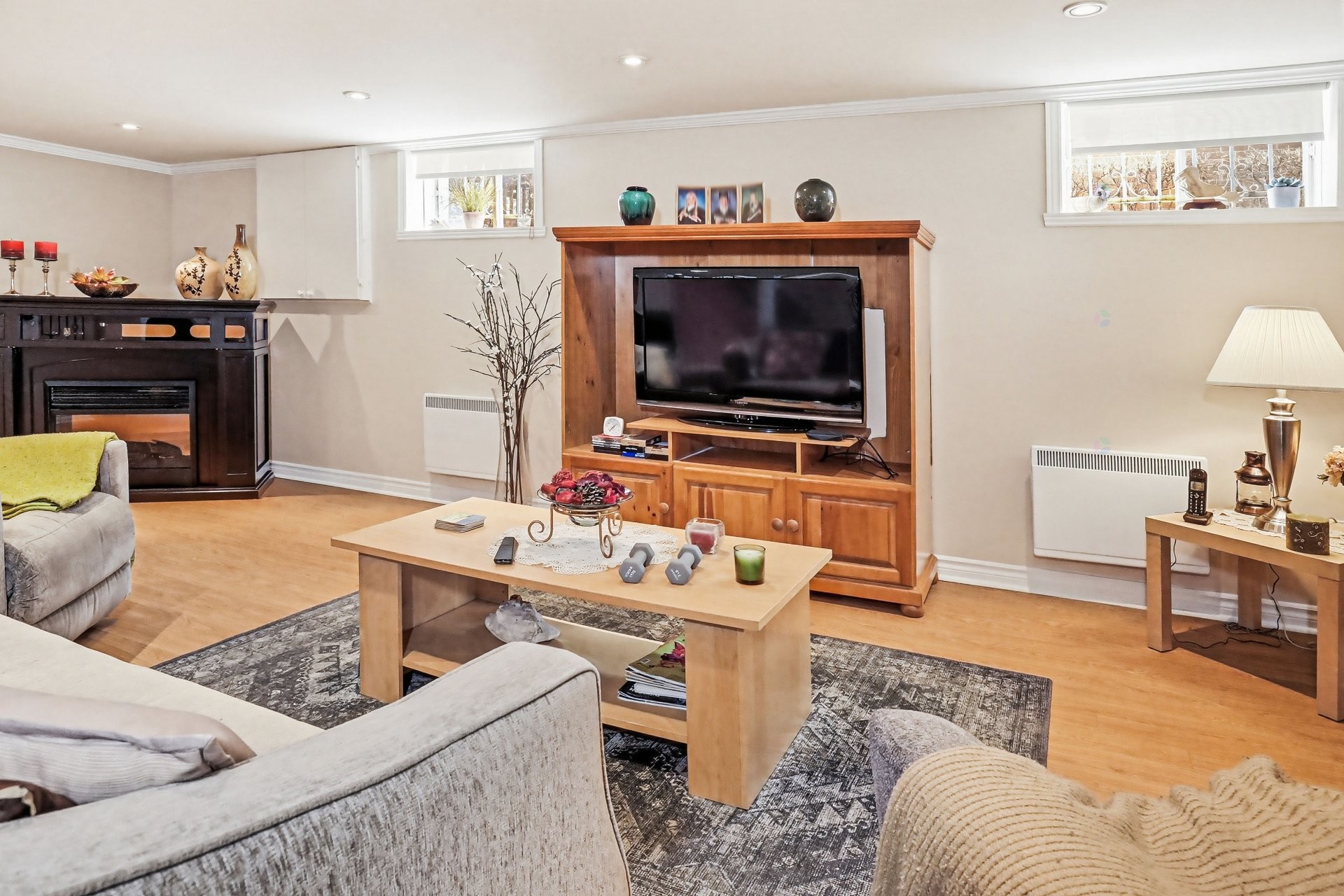Family Room - 759 Av. Devonshire, Laval (Chomedey), QC - Indoor Photo Showing Living Room With Fireplace