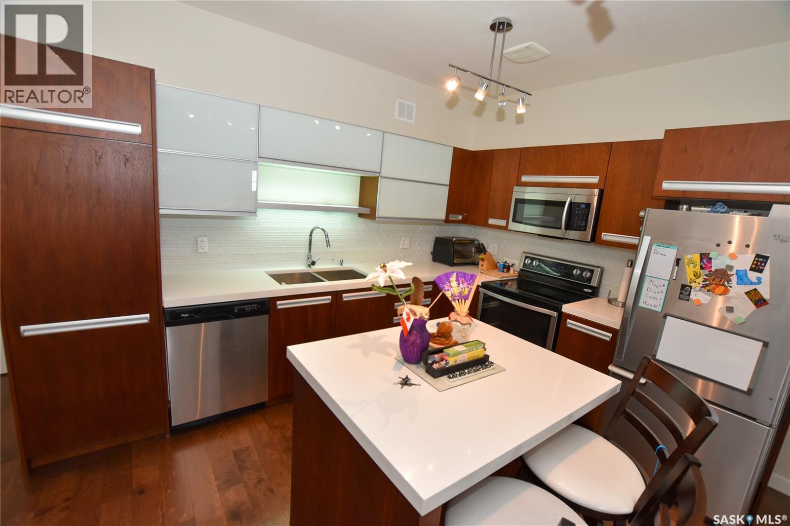 204 2315 Mcclocklin Road, Saskatoon, SK - Indoor Photo Showing Kitchen With Stainless Steel Kitchen With Double Sink