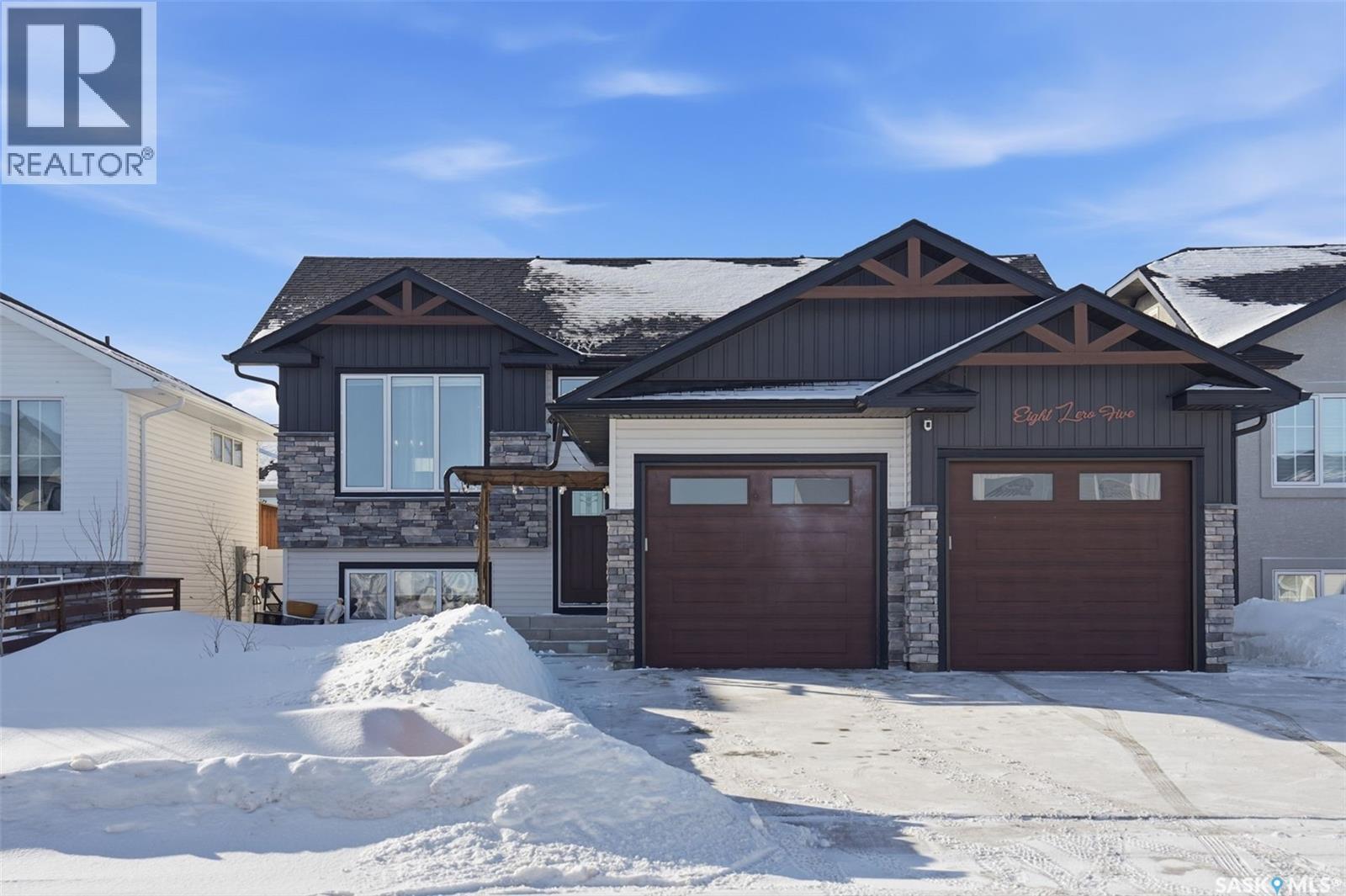 805 Weir Crescent, Warman, SK - Outdoor With Facade